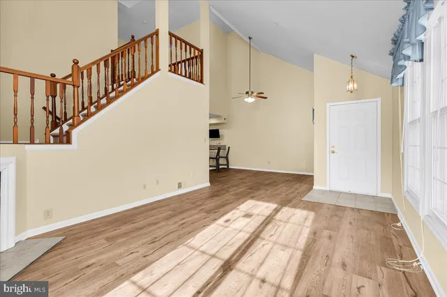 a view of entryway with wooden floor