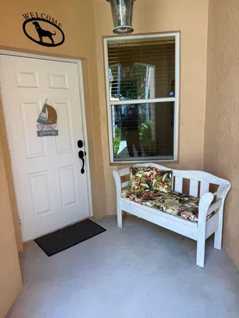 image of a room that has a bed and a window