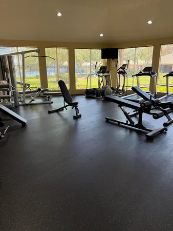 a view of a room with gym equipment