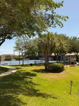 a view of a swimming pool with an outdoor space and seating area