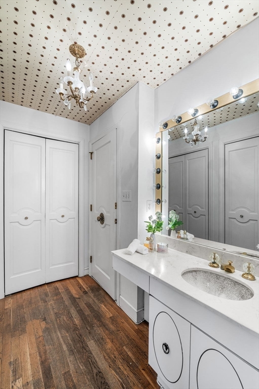 24 Gerald Road Marblehead, MA 01945 - Photo 26 of 37 a bathroom with a sink a mirror and a shower