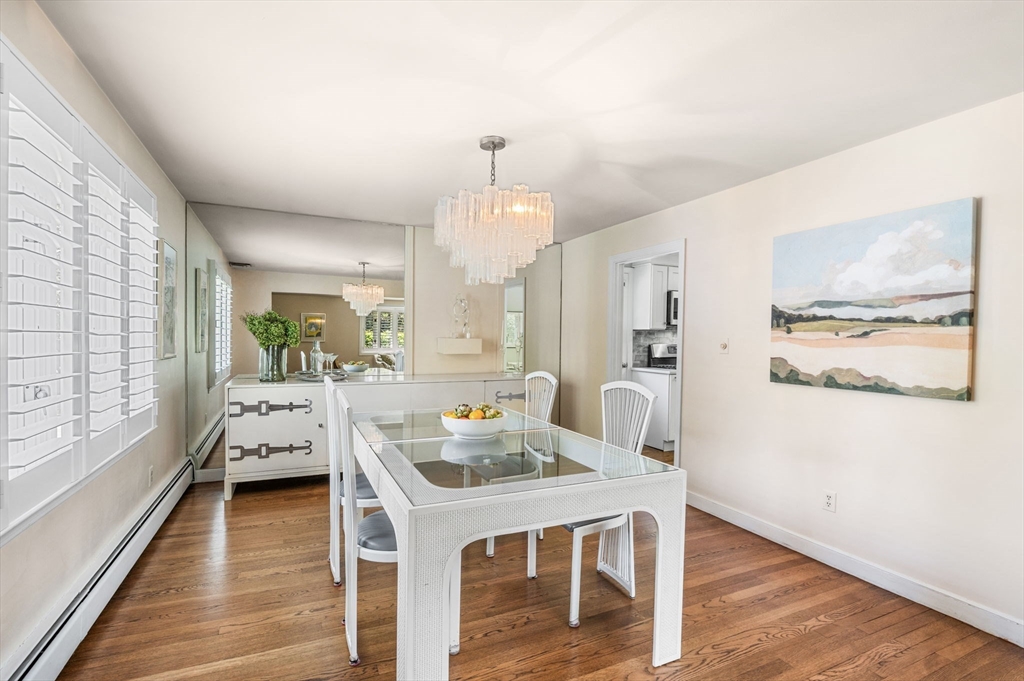 24 Gerald Road Marblehead, MA 01945 - Photo 8 of 37 a view of a dining room with furniture window and wooden floor