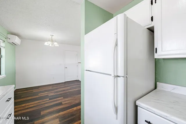 a view of kitchen and closet