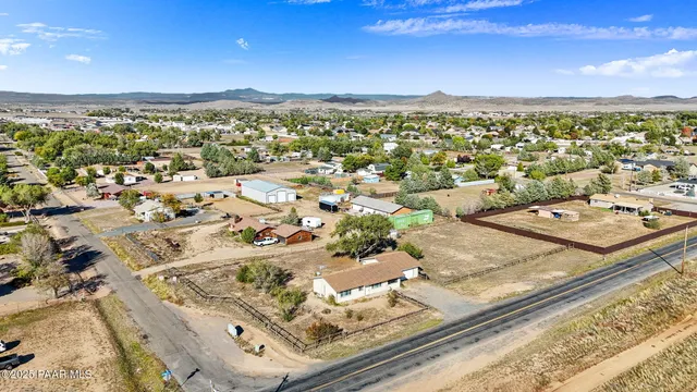 a view of living room with a bed