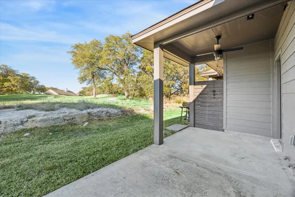 a view of a yard with porch