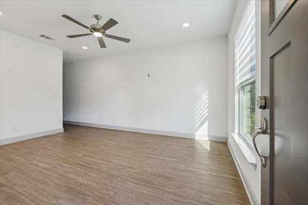 a kitchen with stainless steel appliances granite countertop a sink stove and microwave