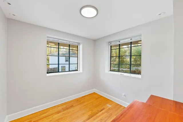 a view of a room with windows