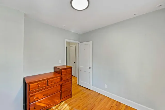 a room with a dresser