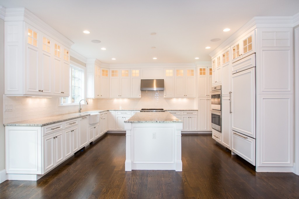 7 Marshall Road Wellesley, MA 02482 - Photo 11 of 29 a large kitchen with cabinets wooden floor and stainless steel appliances