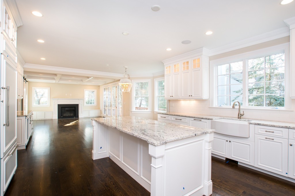 7 Marshall Road Wellesley, MA 02482 - Photo 12 of 29 a kitchen with granite countertop a sink stove and cabinets