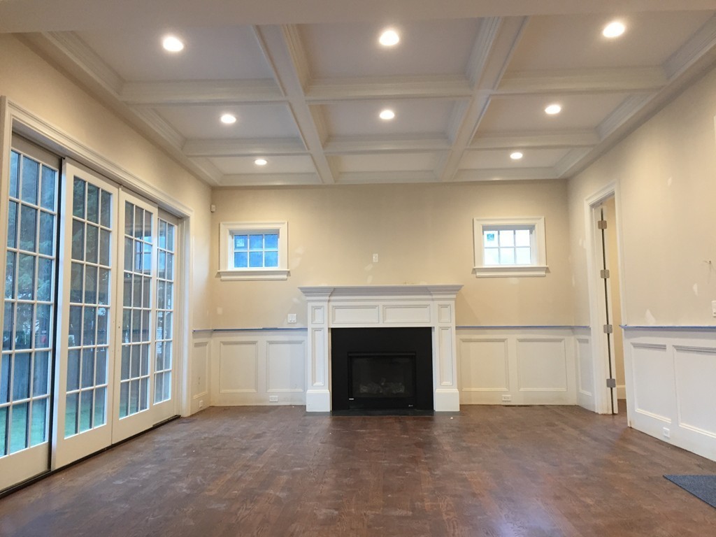 7 Marshall Road Wellesley, MA 02482 - Photo 17 of 29 an empty room with windows and fireplace