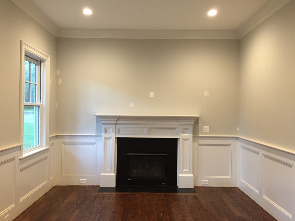 7 Marshall Road Wellesley, MA 02482 - Photo 18 of 29 a living room with a fireplace