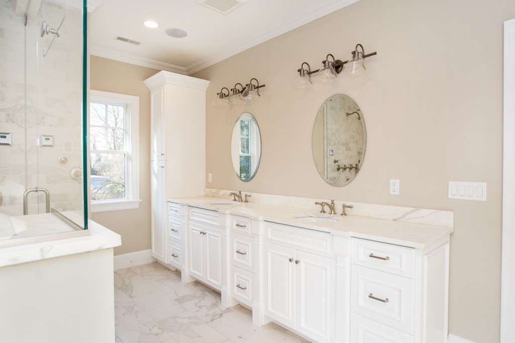 7 Marshall Road Wellesley, MA 02482 - Photo 23 of 29 a bathroom with double vanity sink and a mirror