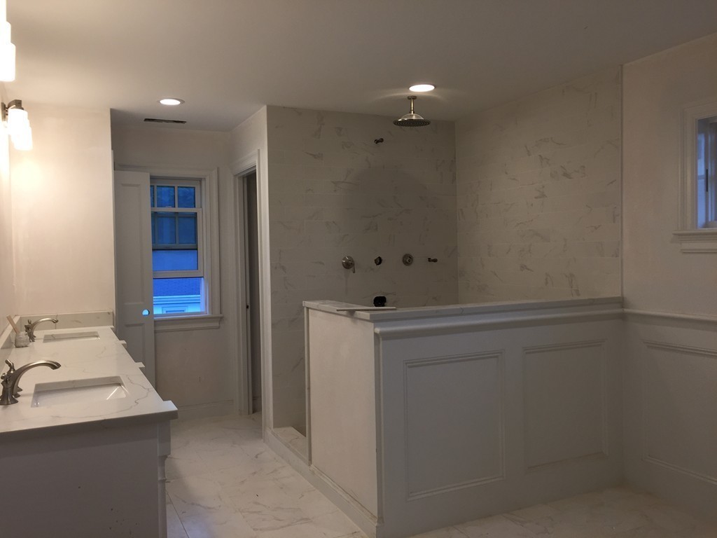 7 Marshall Road Wellesley, MA 02482 - Photo 25 of 29 a bathroom with a sink and mirror