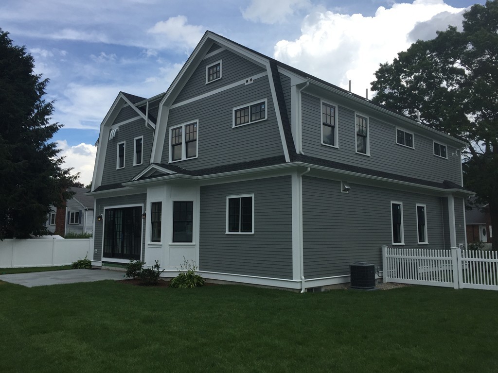 7 Marshall Road Wellesley, MA 02482 - Photo 5 of 29 a front view of a house with a garden