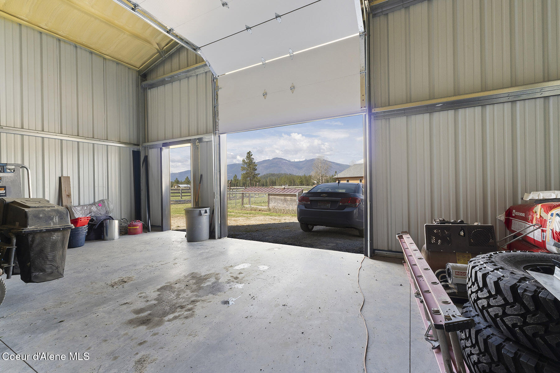 135 Honeysuckle Road Bonners Ferry, ID 83805 - Photo 24 of 28 Shop with Auto Door
