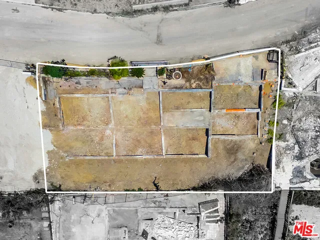 a bathroom with a granite countertop shower and a sink