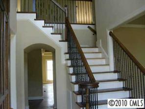2718 Old Course Road Monroe, NC 28112 - Photo 3 of 8 a view of entryway and hall with wooden floor