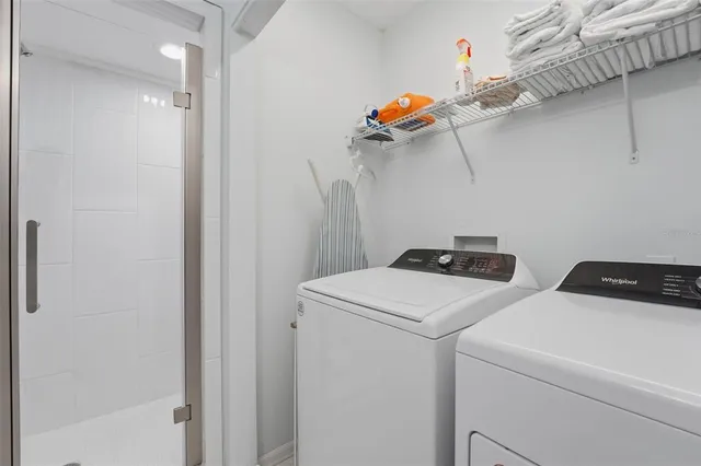 a utility room with dryer and washer