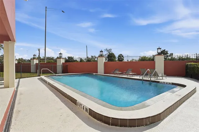 a view of a swimming pool with a lake