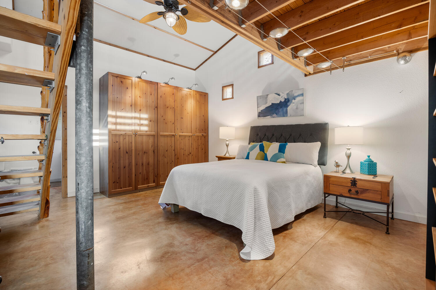 650 Angel Fire Drive Dripping Springs, TX 78620 - Photo 12 of 40 a bed room with a bed and a chair