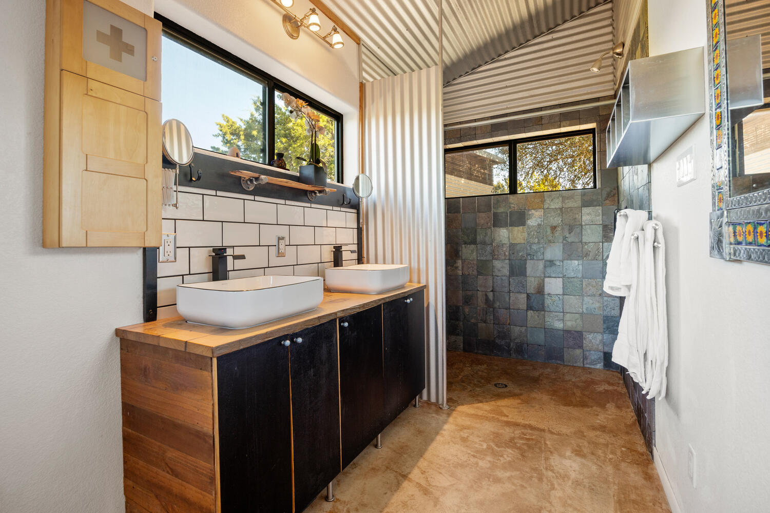 650 Angel Fire Drive Dripping Springs, TX 78620 - Photo 15 of 40 a bathroom with a sink and a mirror