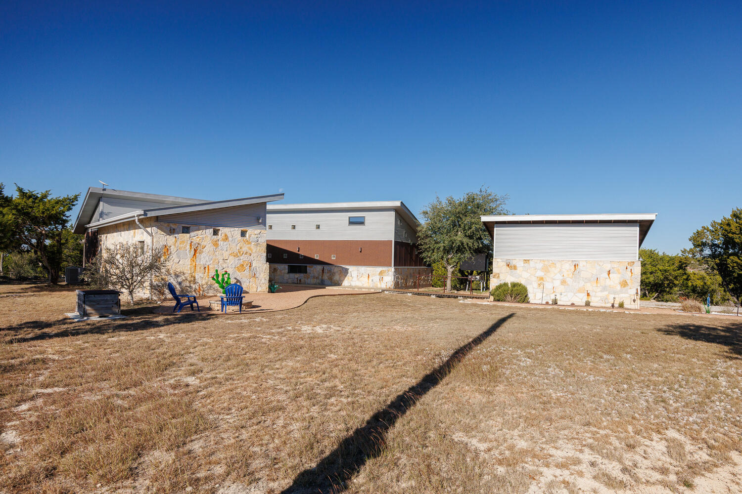 650 Angel Fire Drive Dripping Springs, TX 78620 - Photo 29 of 40 a view of garage with a car parked in it