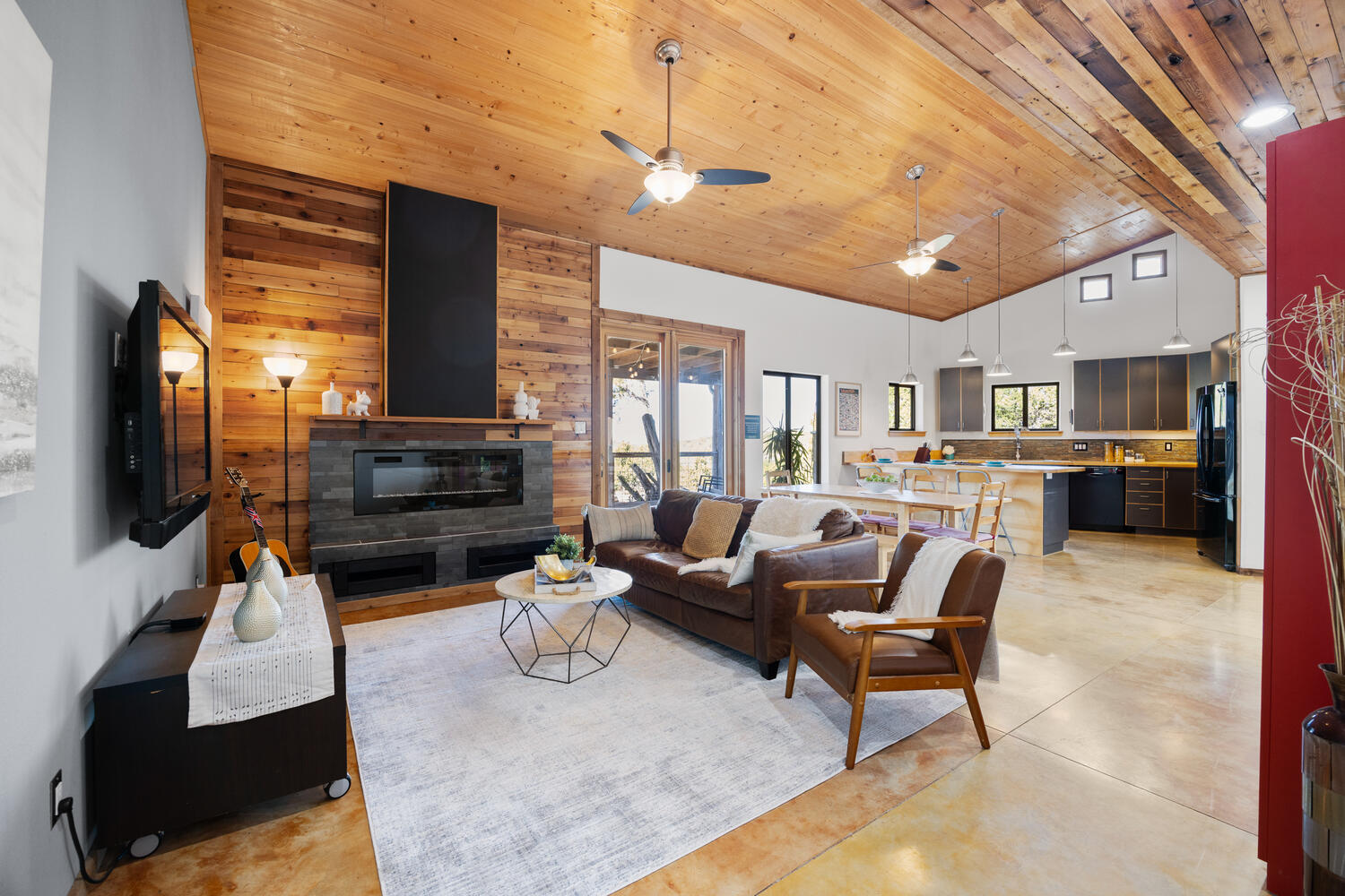 650 Angel Fire Drive Dripping Springs, TX 78620 - Photo 7 of 40 a living room with furniture and a flat screen tv
