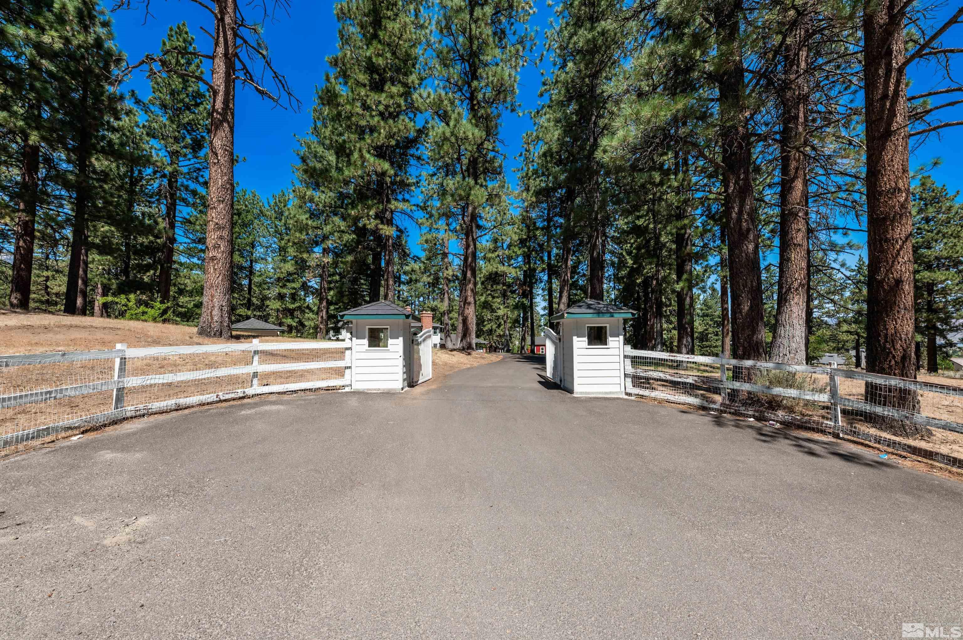 7250 Franktown Road Washoe Valley, NV 89704 - Photo 2 of 40 a view of a street with trees