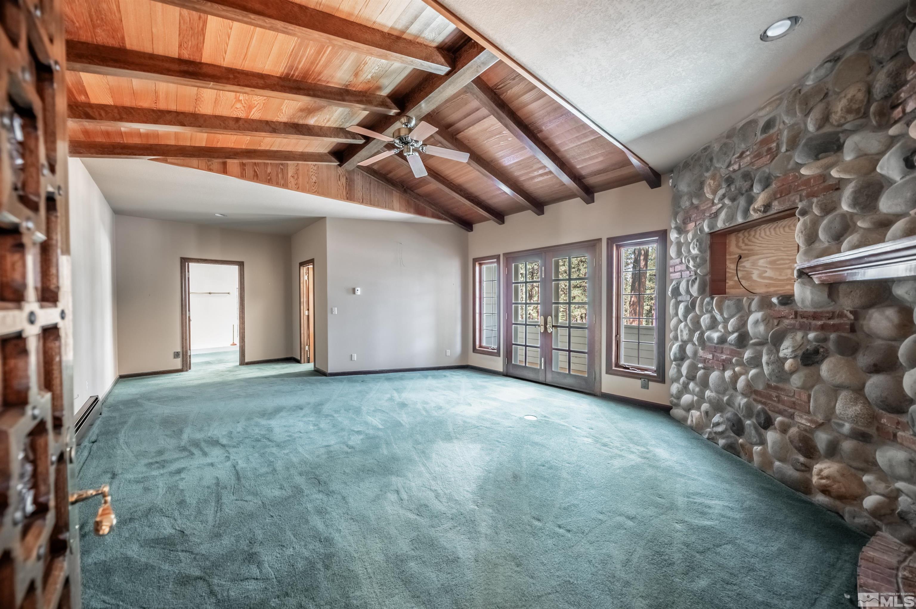 7250 Franktown Road Washoe Valley, NV 89704 - Photo 21 of 40 a view of an empty room with windows