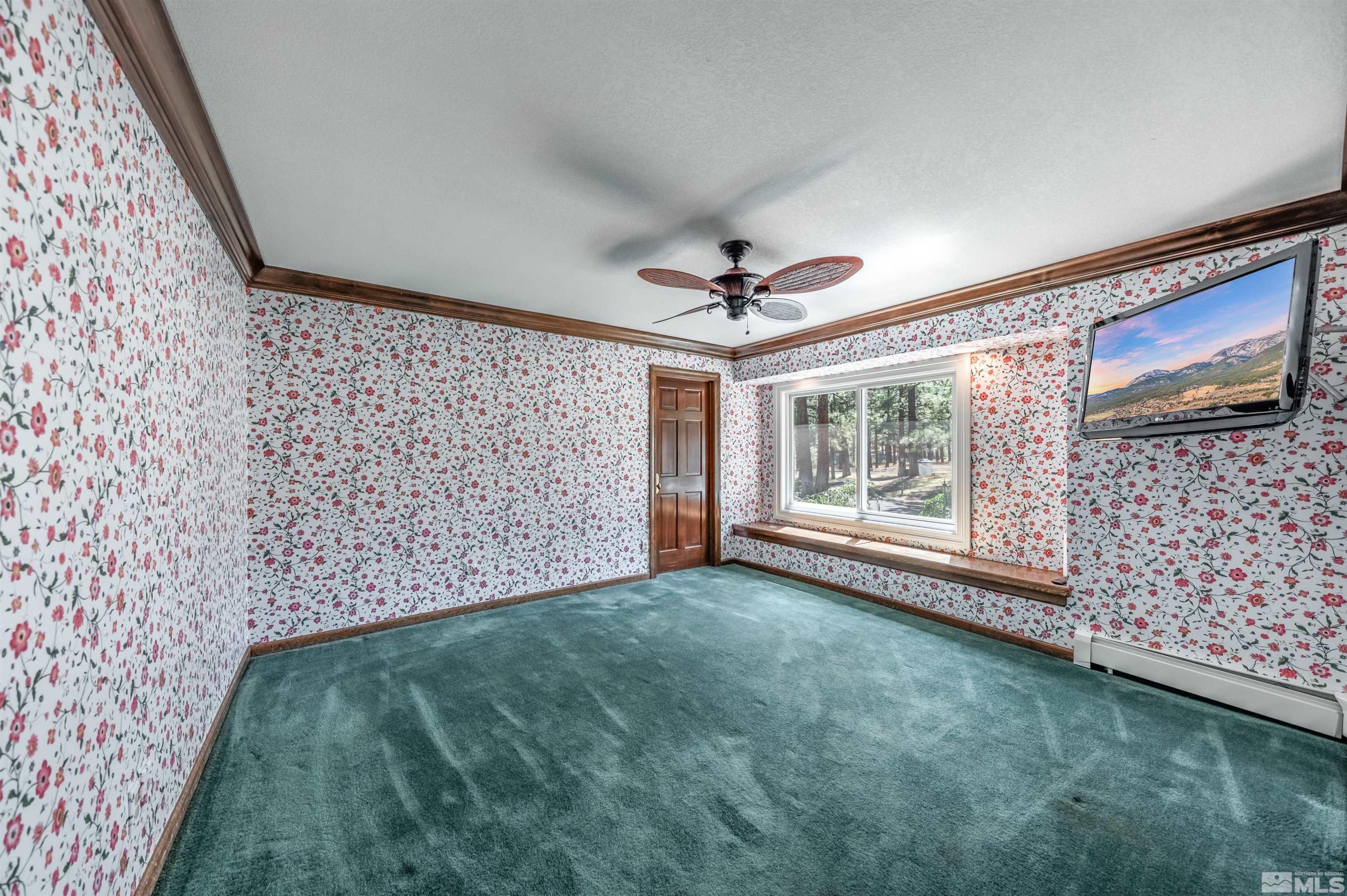 7250 Franktown Road Washoe Valley, NV 89704 - Photo 26 of 40 a view of an empty room with a window