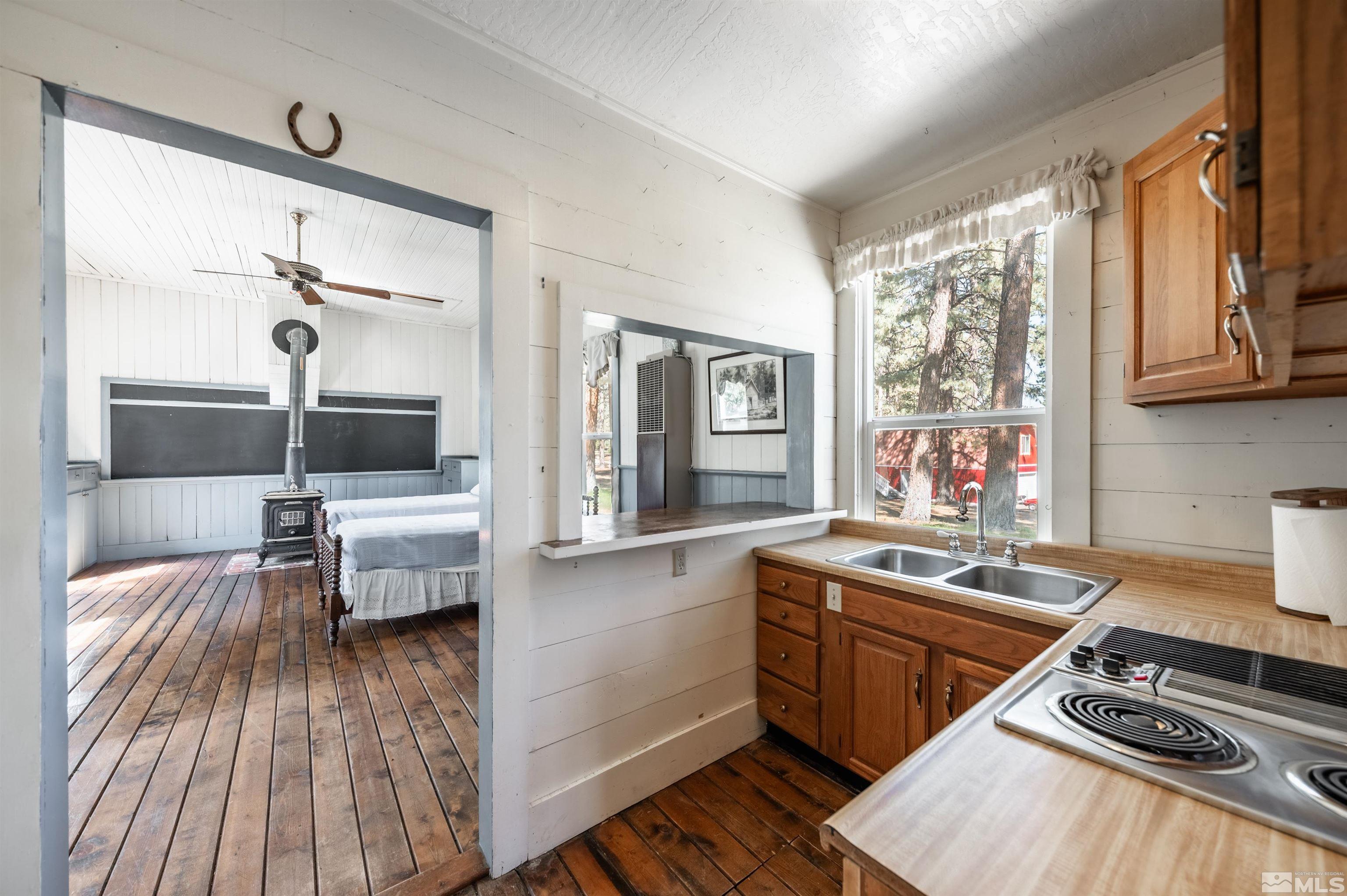 7250 Franktown Road Washoe Valley, NV 89704 - Photo 32 of 40 a kitchen that has a sink and a stove