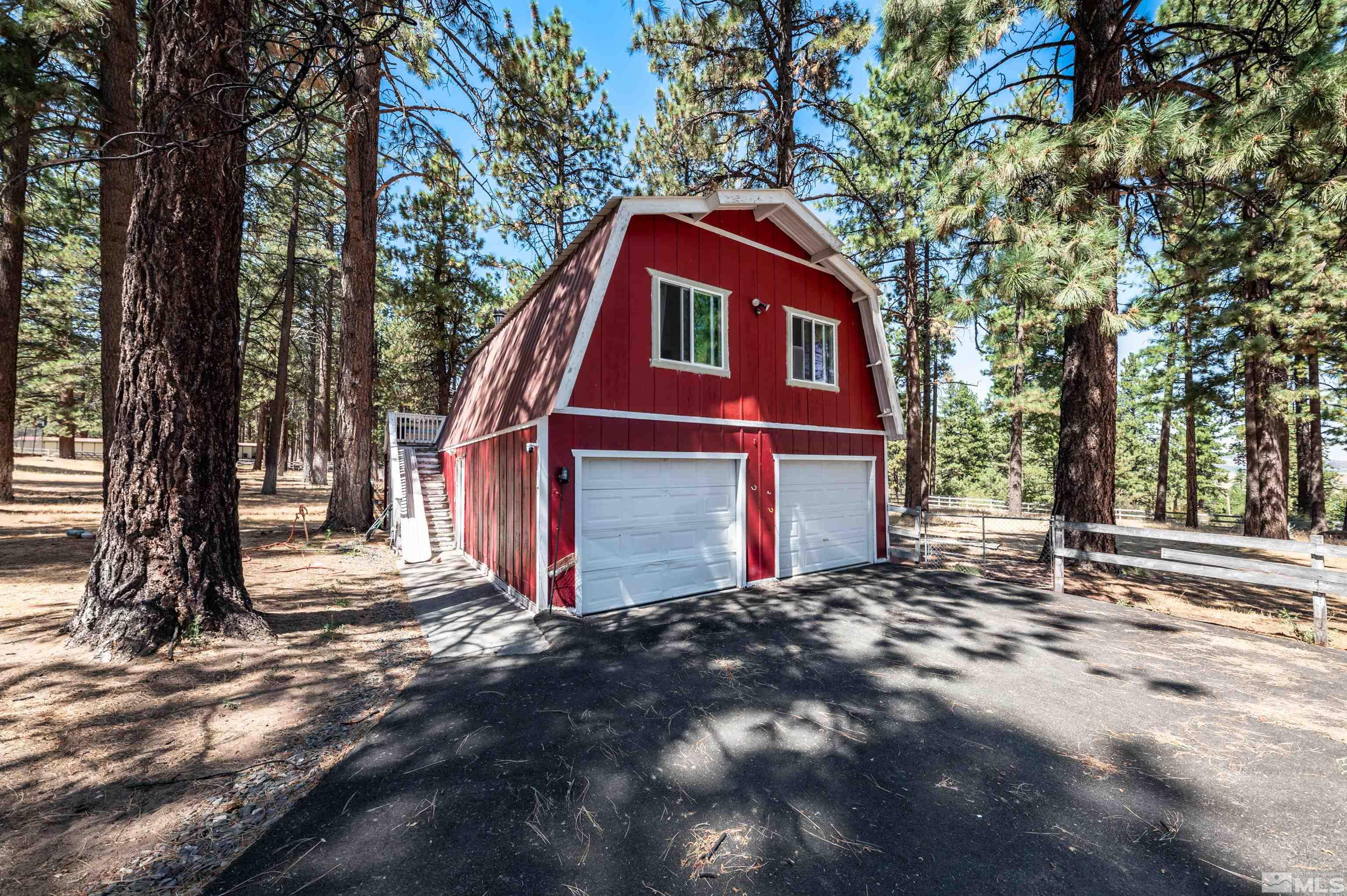 7250 Franktown Road Washoe Valley, NV 89704 - Photo 35 of 40 a view of a house with a yard