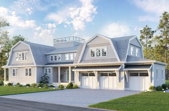 a view of a white building among the front of a yard