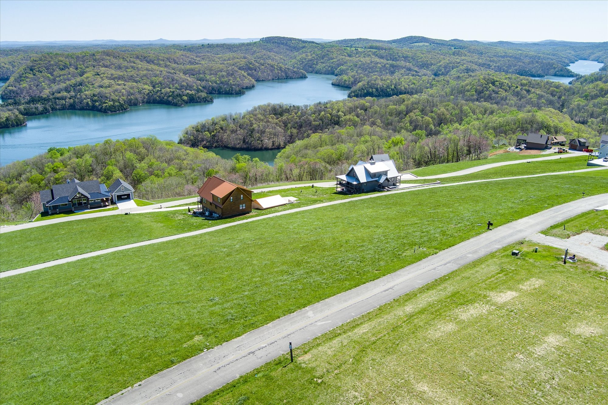 33 A Swan Ridge Road Celina, TN 38551 - Photo 3 of 10 a view of a field with a lake