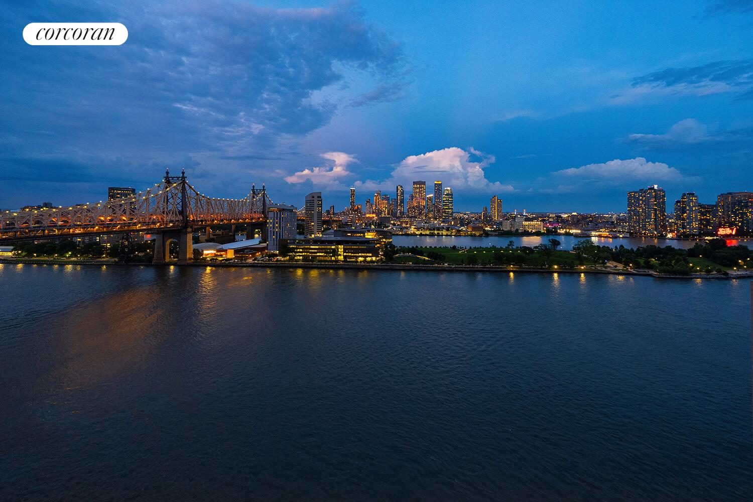 1 Sutton Place South, Unit PH Manhattan, NY 10022 - Photo 25 of 26 a view of a city with lots of residential buildings lake and ocean view