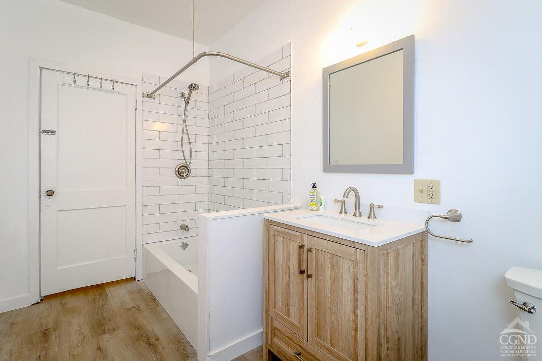 101 Orinsekwa Road Valatie, NY 12184 - Photo 9 of 23 a bathroom with a sink a toilet and shower