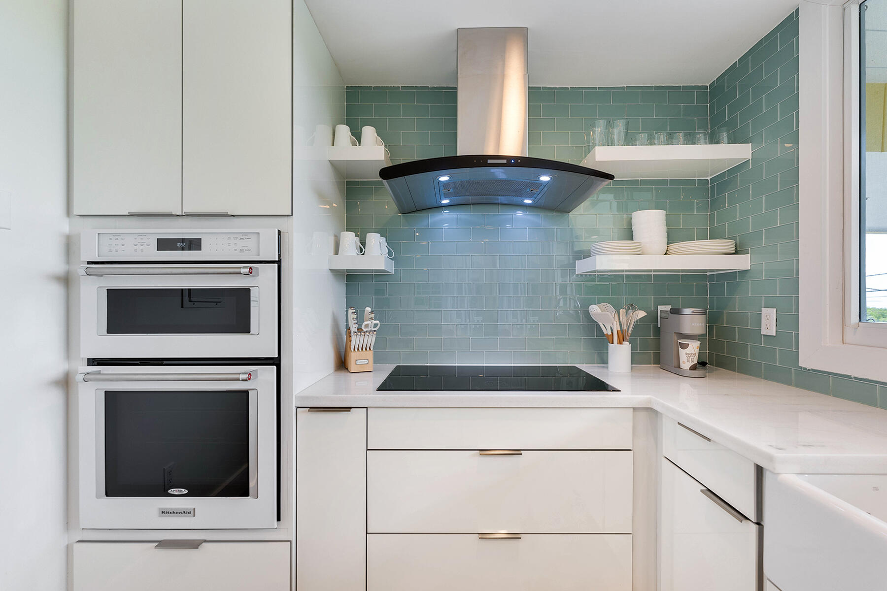 102 South Drive Key Largo, FL 33037 - Photo 9 of 26 a kitchen with a sink a stove and cabinets