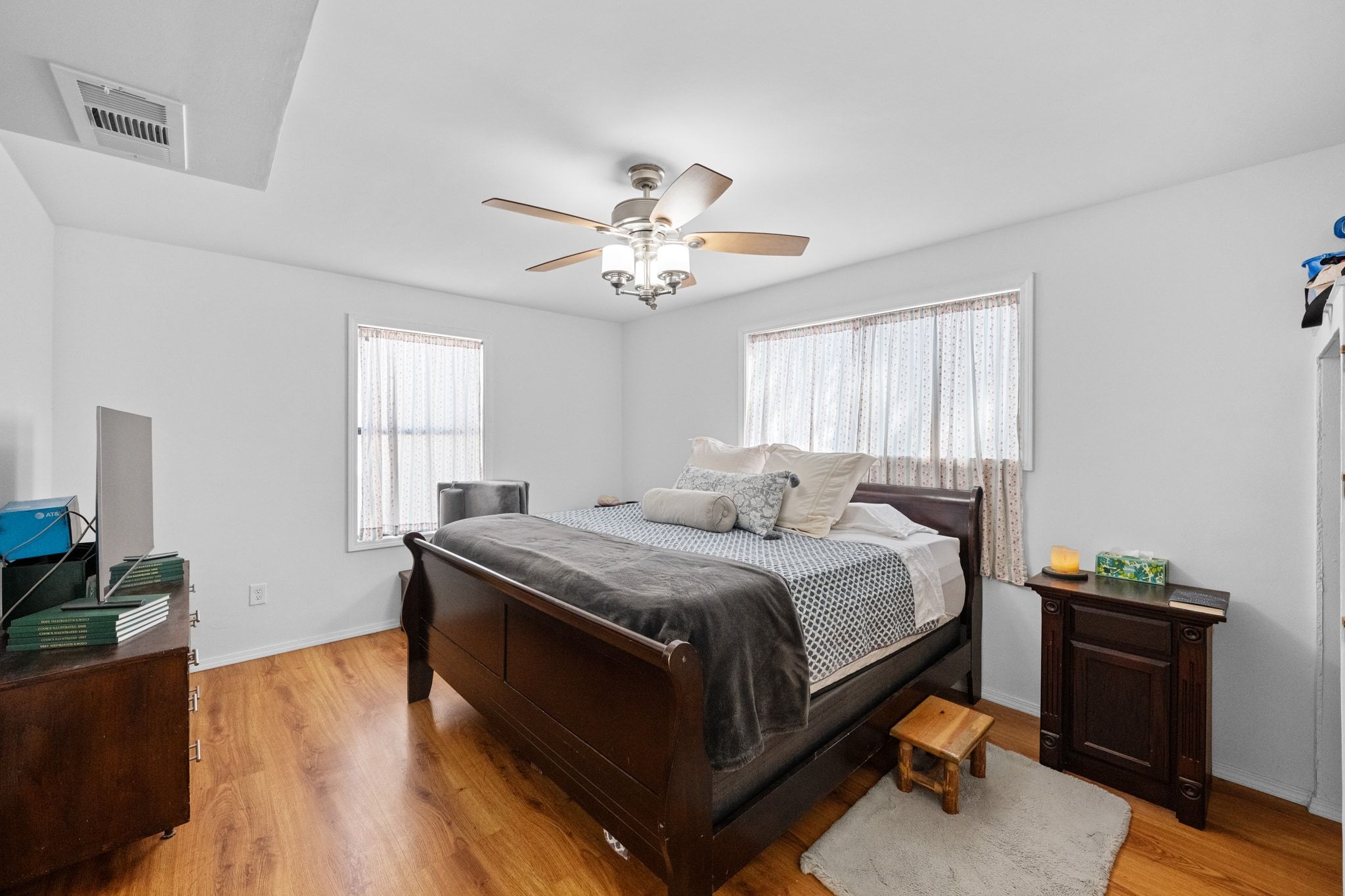 376 Jones Road Cedar Creek, TX 78612 - Photo 11 of 40 a bed room with a bed and a chandelier