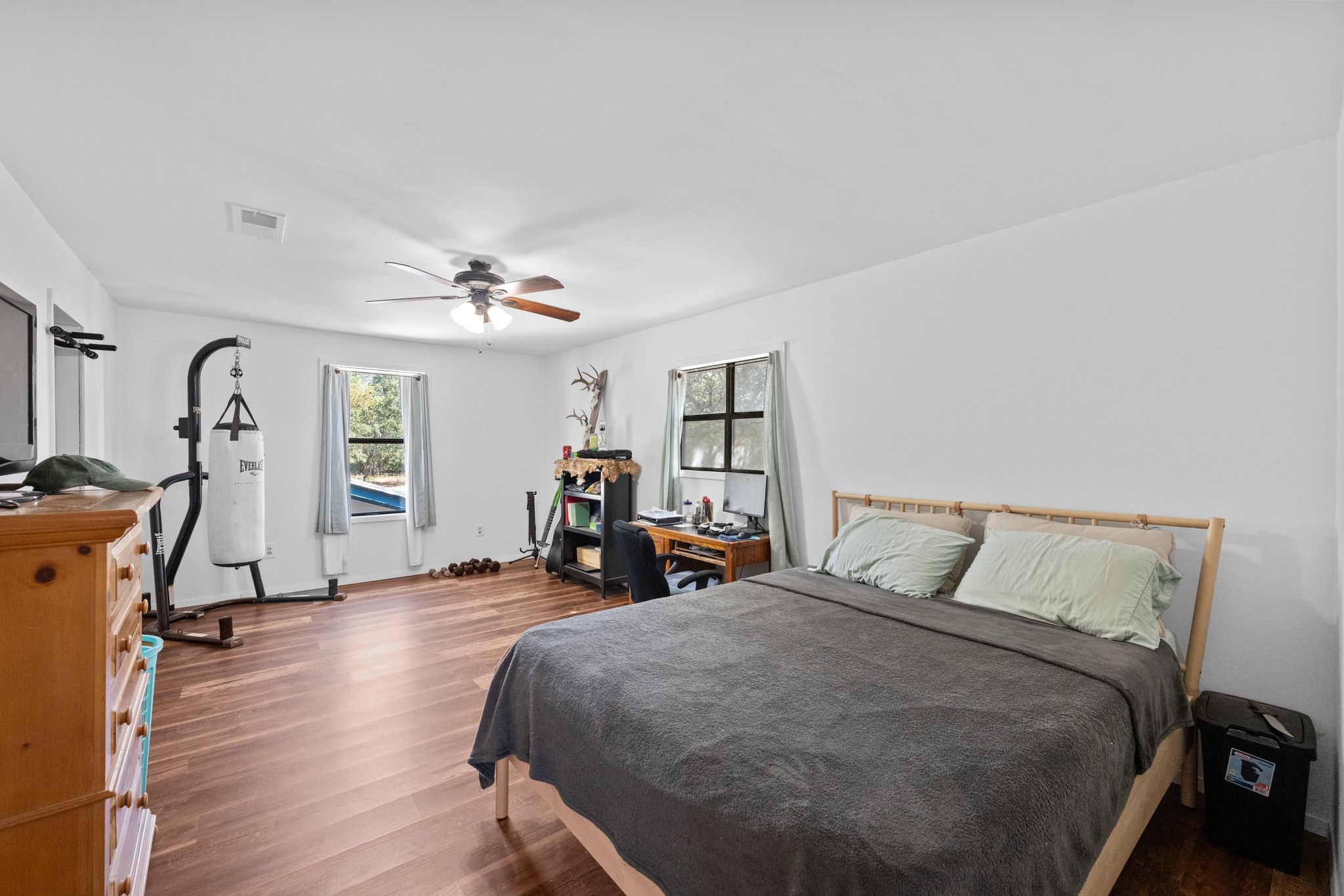 376 Jones Road Cedar Creek, TX 78612 - Photo 14 of 40 a bed room with a bed and a table