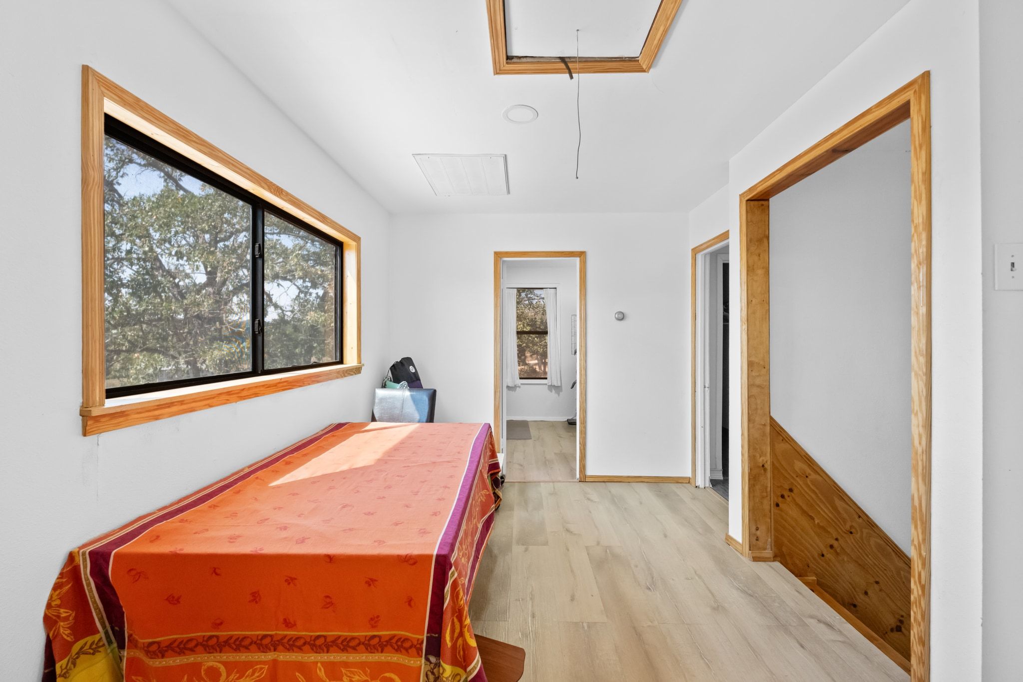 376 Jones Road Cedar Creek, TX 78612 - Photo 19 of 40 a room with wooden floor and windows