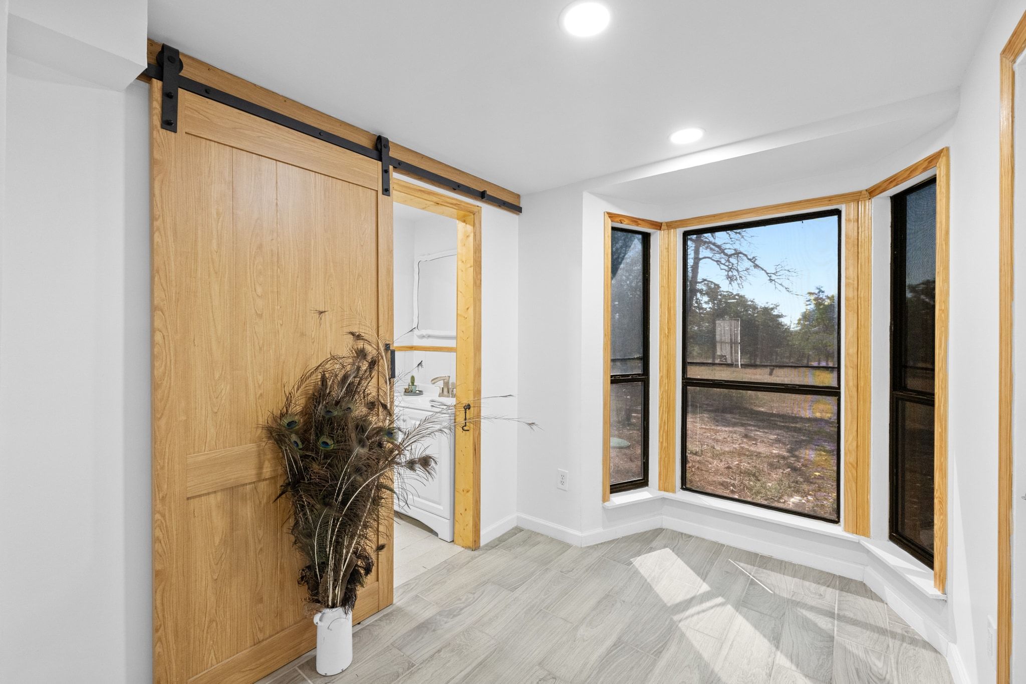 376 Jones Road Cedar Creek, TX 78612 - Photo 20 of 40 a view of a room with window and front door