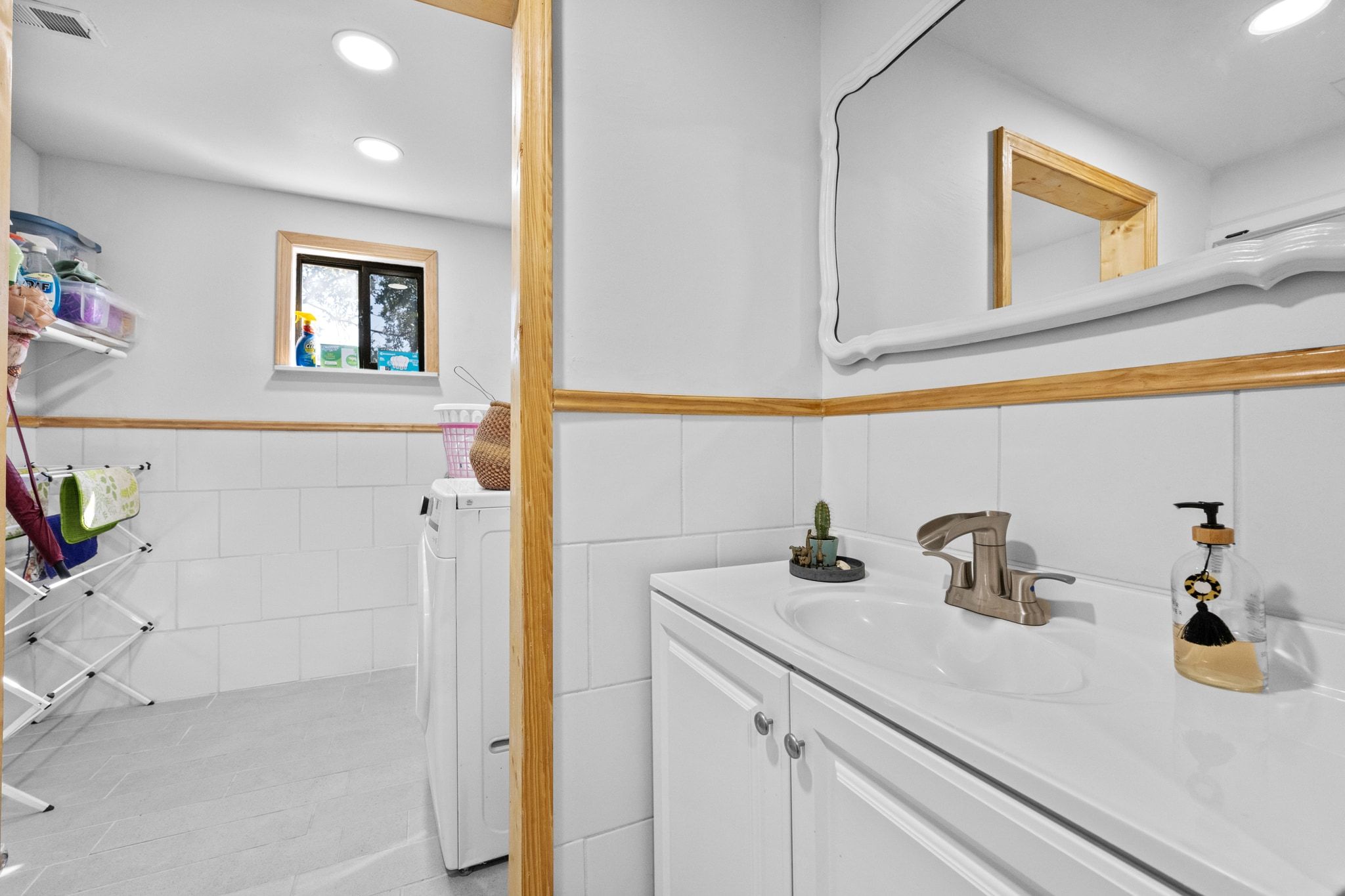 376 Jones Road Cedar Creek, TX 78612 - Photo 21 of 40 a bathroom with a sink a mirror and vanity