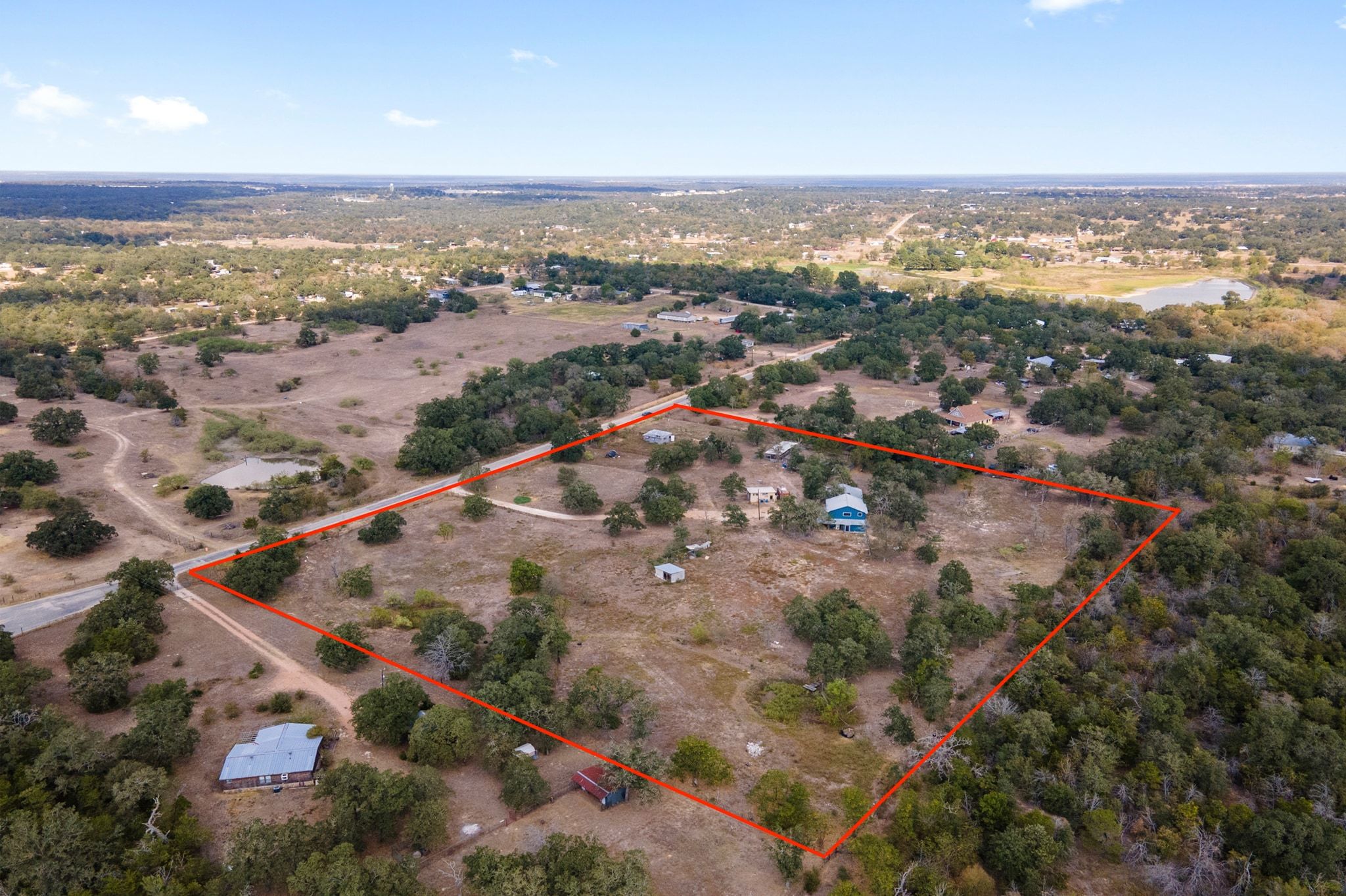 376 Jones Road Cedar Creek, TX 78612 - Photo 31 of 40 an aerial view of ocean and residential houses with outdoor space