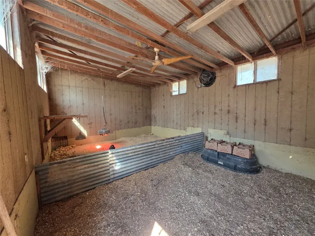 a view of a roof deck with wooden floor