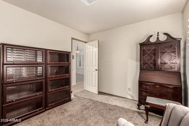 a view of room with furniture and closet