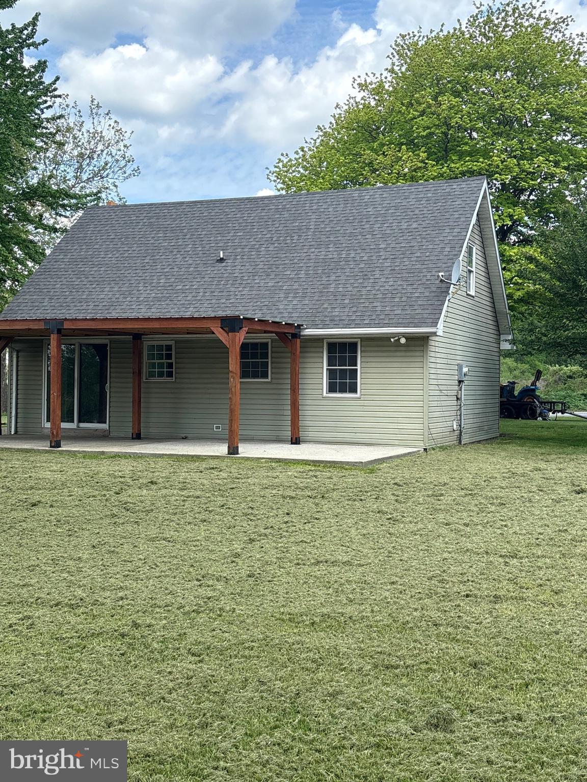 933 Buck Road Quarryville, PA 17566 - Photo 6 of 8 a house that has a tree in front of it