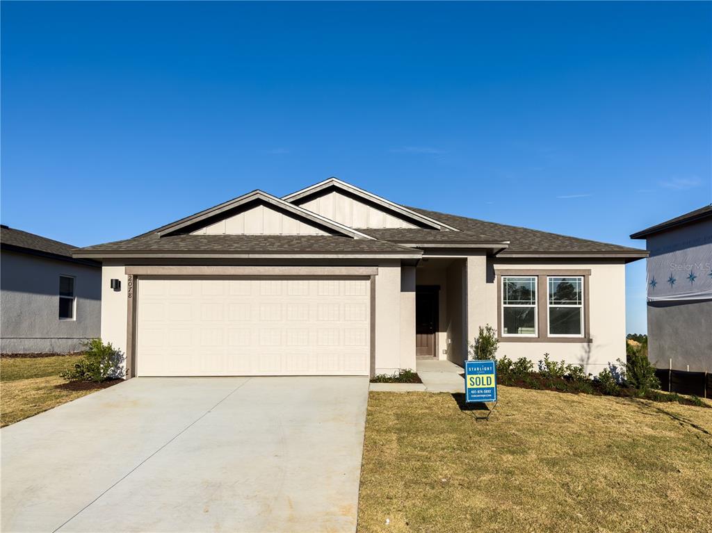 2078 Huntsman Rdg Road Minneola, FL 34715 - Photo 1 of 1 a view of a house with a outdoor space
