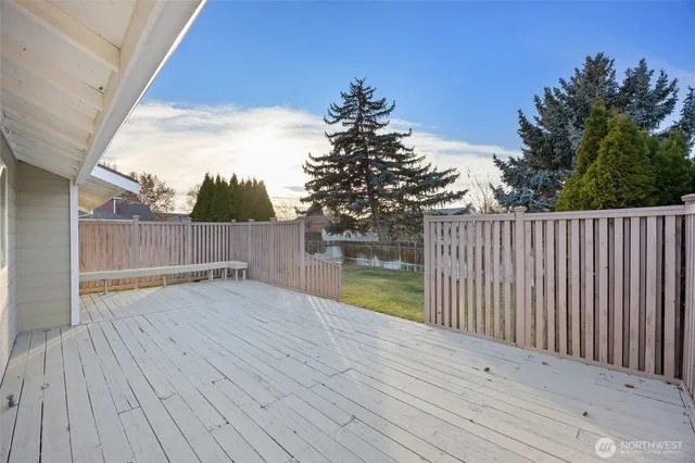 a view of wooden floor and a lake view