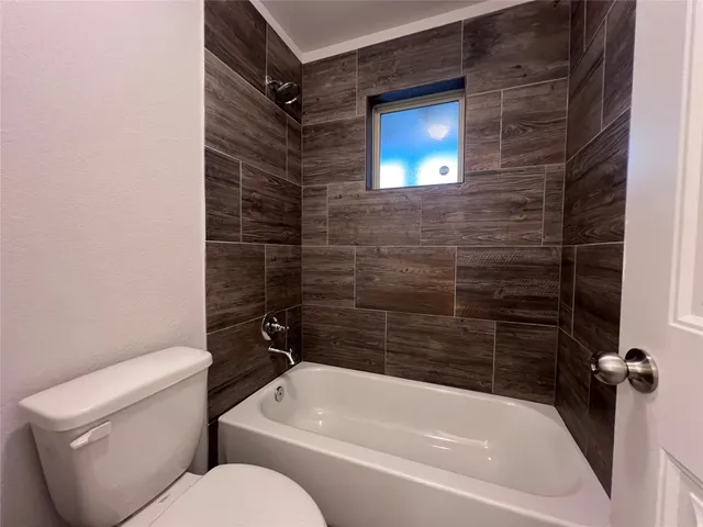a bathroom with a double vanity sink and mirror